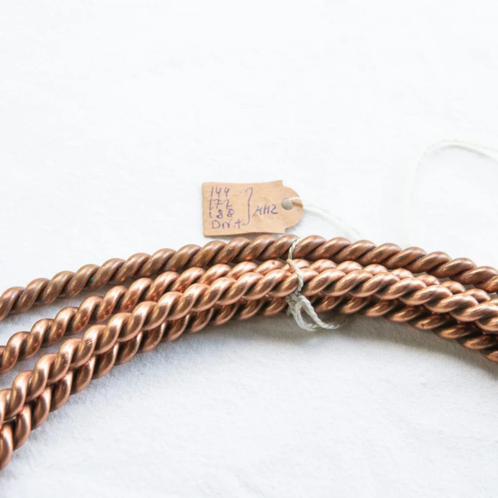 Tensory, ringi i bransoletki miedziane HANDMADE — butelka z przodu, etykieta